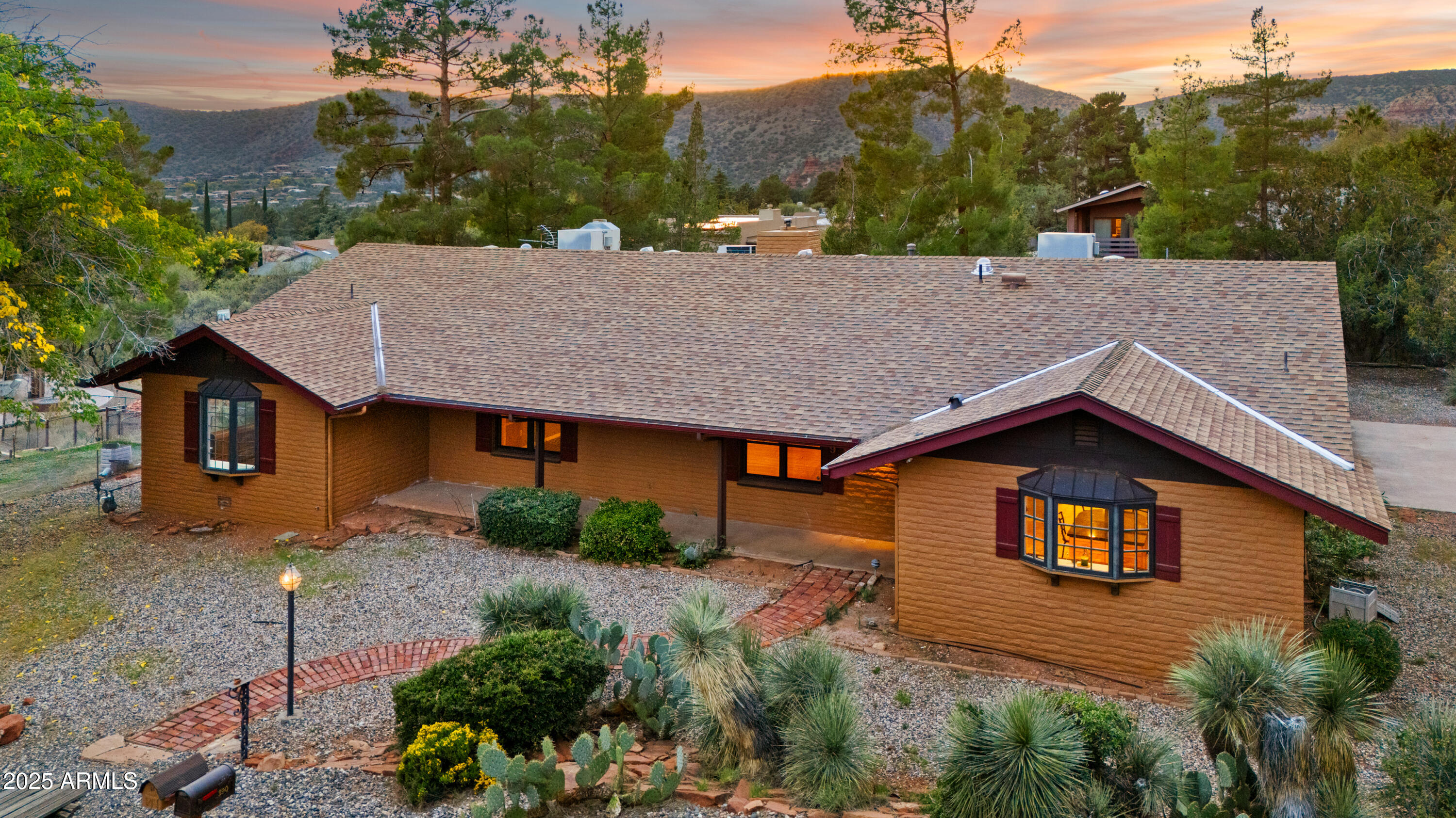 195 Courthouse Butte Road Sedona, AZ 86351 - Photo 31 of 31 a aerial view of a house next to a yard