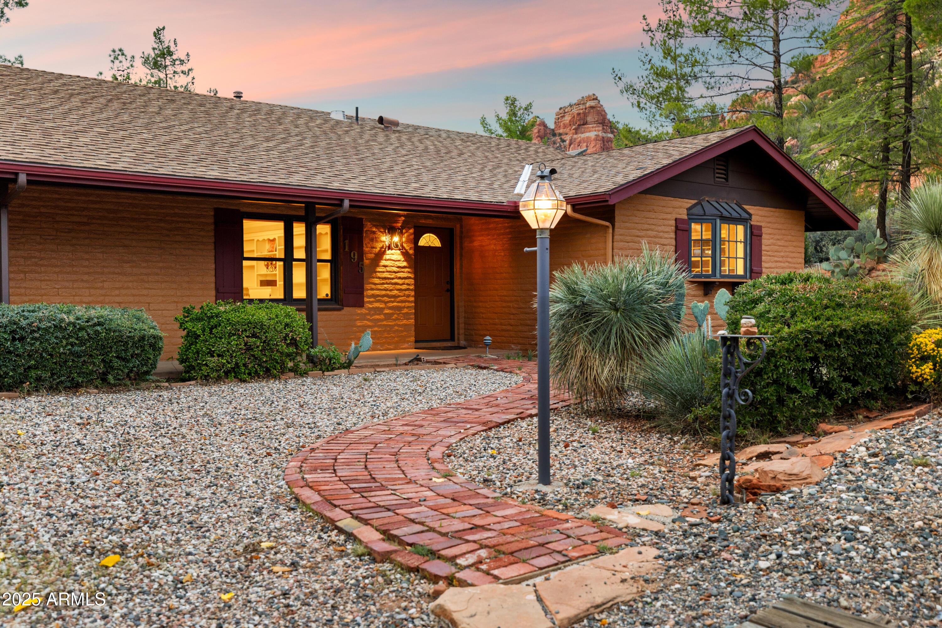 195 Courthouse Butte Road Sedona, AZ 86351 - Photo 7 of 31 a front view of house with yard and green space