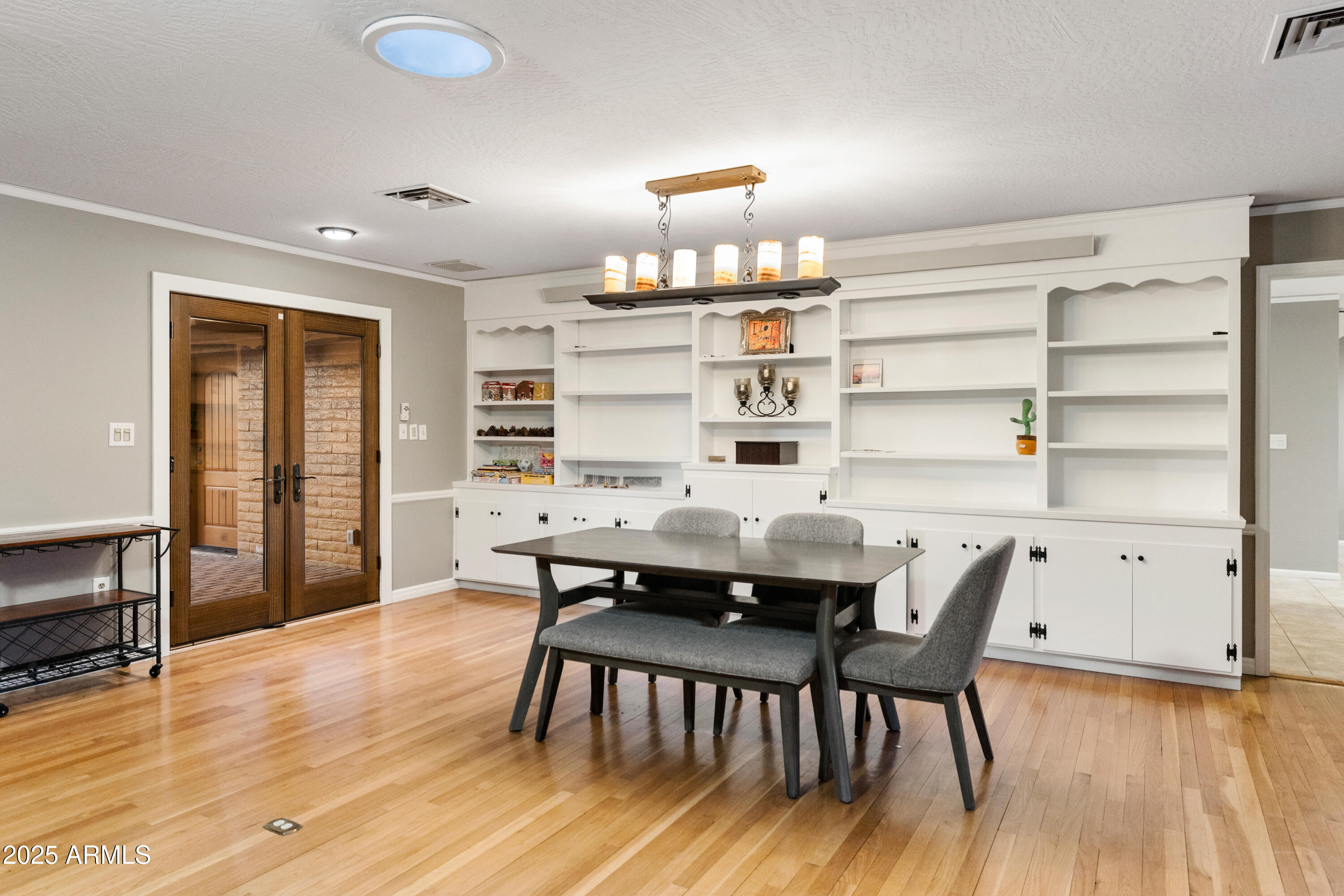 195 Courthouse Butte Road Sedona, AZ 86351 - Photo 10 of 31 a view of a dining room with furniture and wooden floor