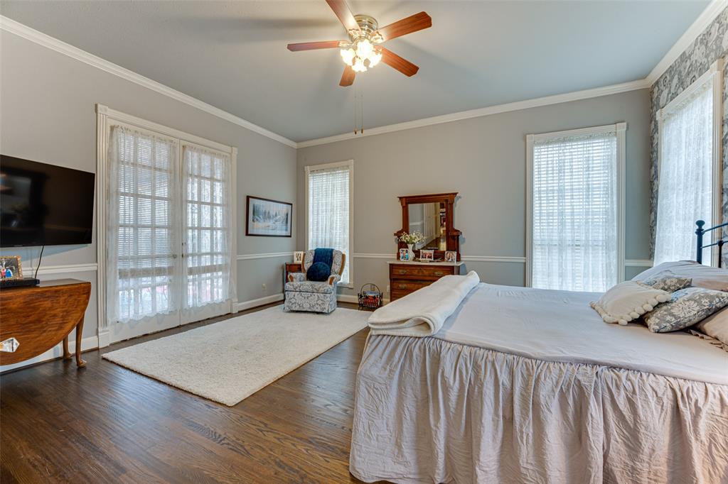 707 Cullins Road Rockwall, TX 75032 - Photo 14 of 35 a bedroom with furniture and a window