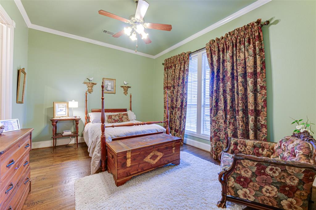 707 Cullins Road Rockwall, TX 75032 - Photo 17 of 35 a bedroom with bed and a window