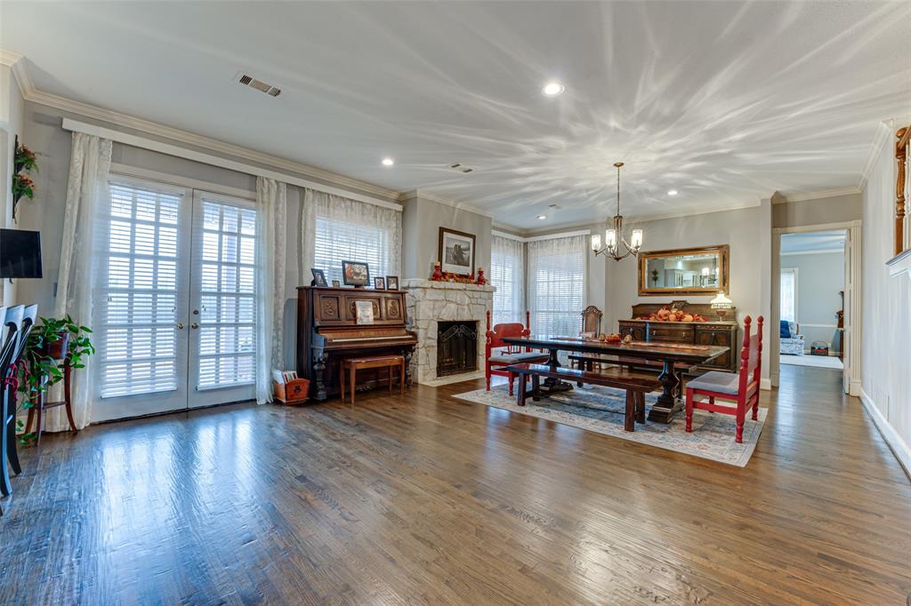707 Cullins Road Rockwall, TX 75032 - Photo 30 of 35 a living room with furniture and wooden floor