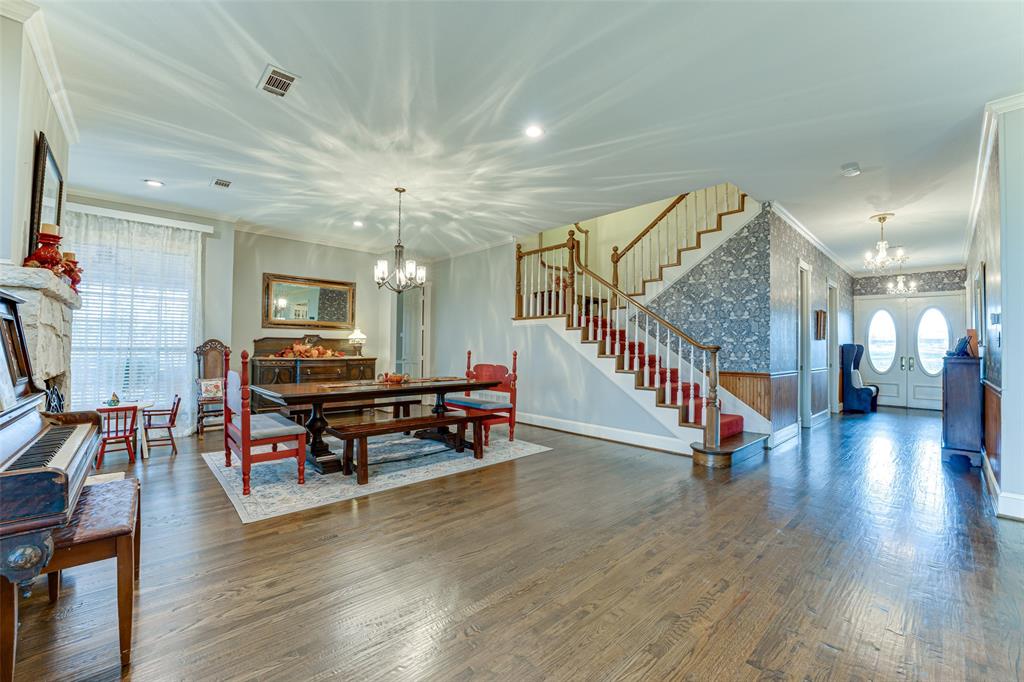 707 Cullins Road Rockwall, TX 75032 - Photo 32 of 35 a living room with furniture and a wooden floor
