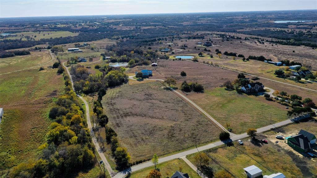 707 Cullins Road Rockwall, TX 75032 - Photo 35 of 35 an aerial view of residential houses with outdoor space
