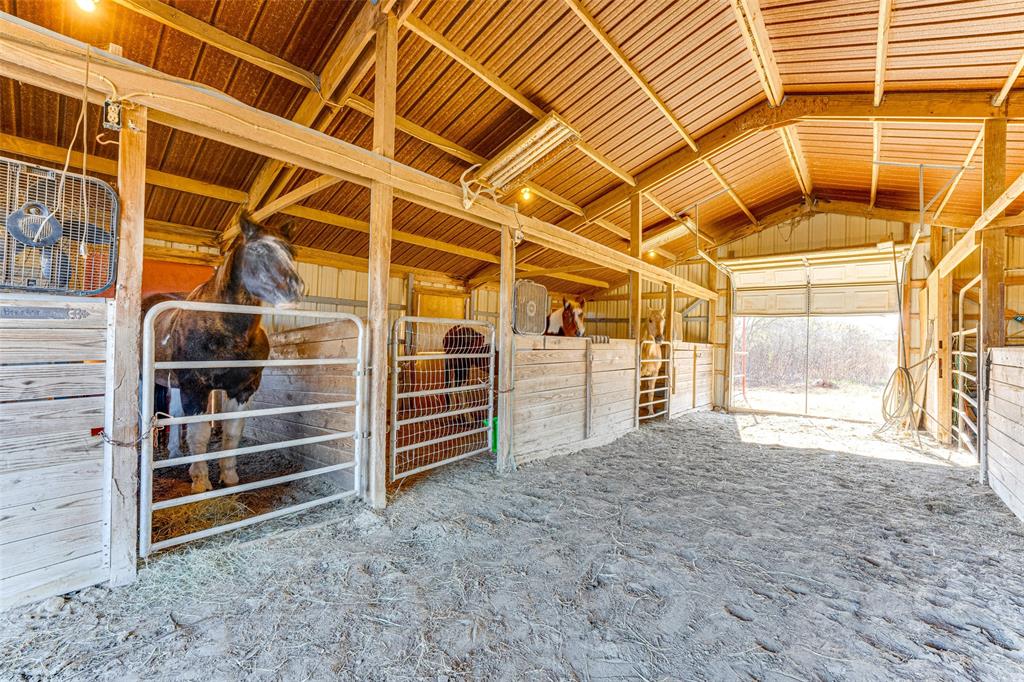707 Cullins Road Rockwall, TX 75032 - Photo 4 of 35 a view of a room with wooden walls