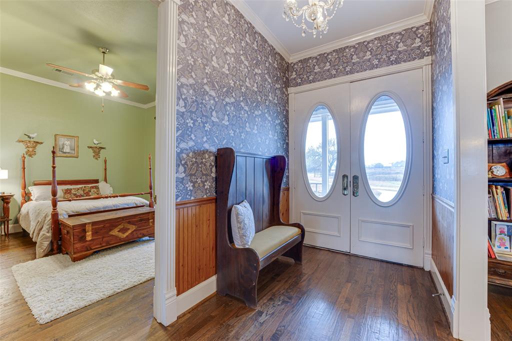 707 Cullins Road Rockwall, TX 75032 - Photo 6 of 35 a living room with furniture and a wooden floor