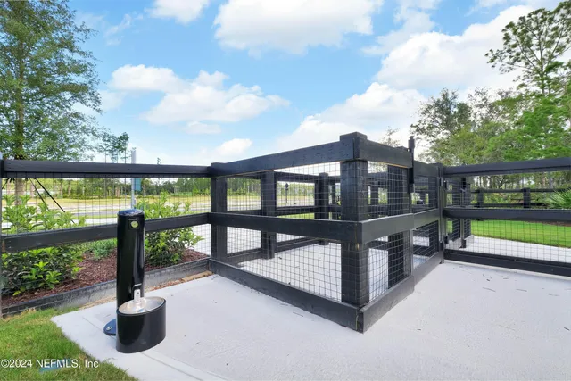 a view of a bench in front of a building