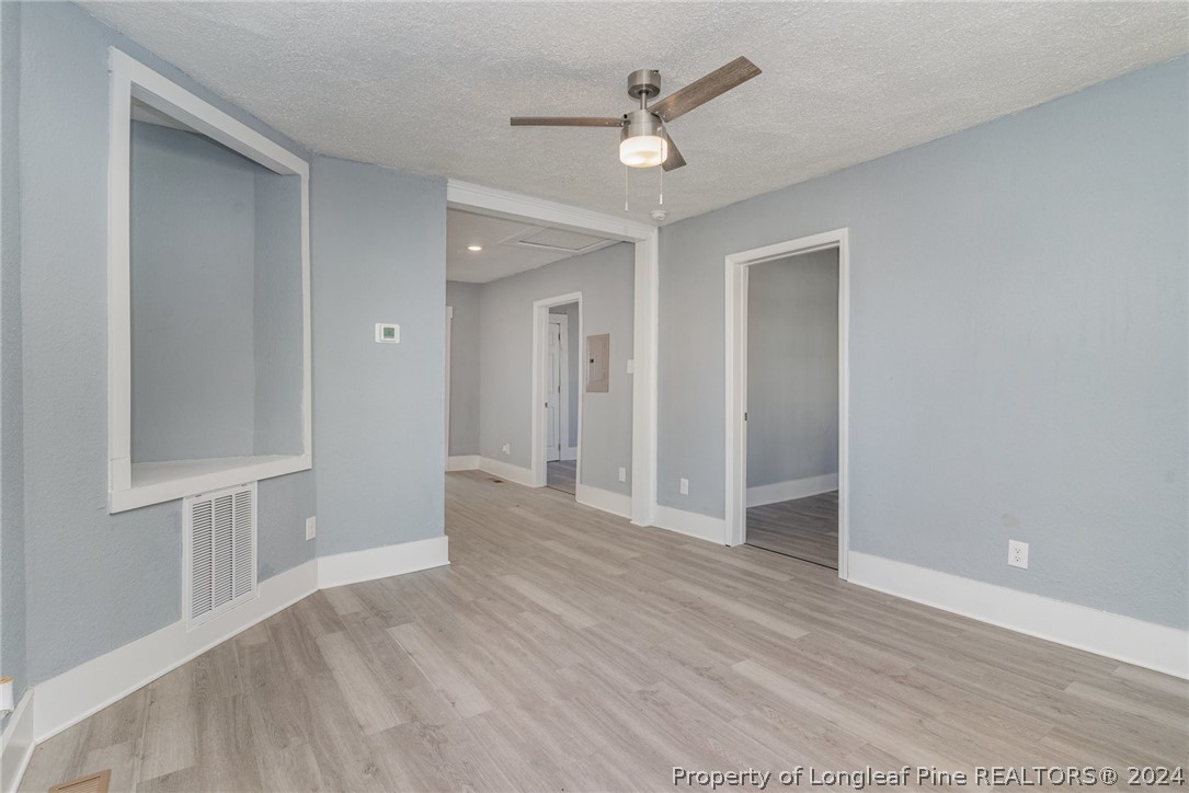 1218 Boyer Street Raleigh, NC 27610 - Photo 4 of 12 a view of an empty room with a window