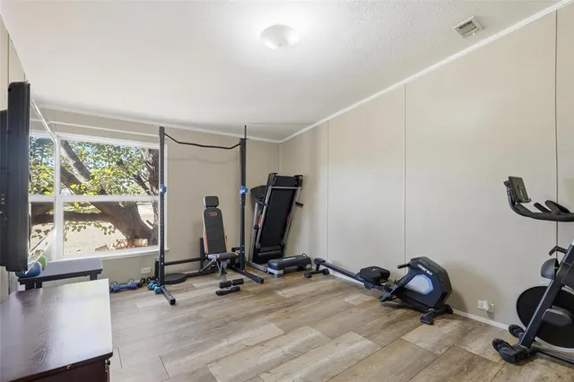 a view of a room with gym equipment