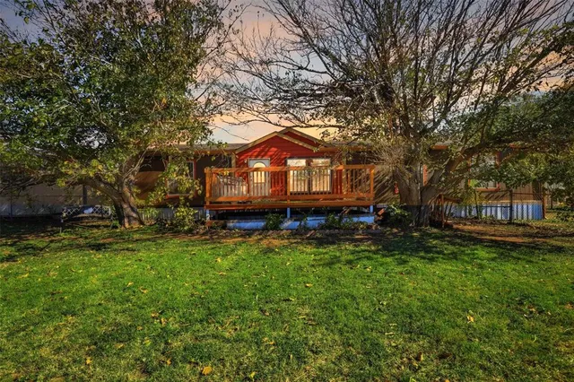 a house view with a garden space