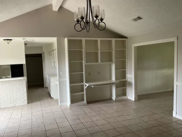 a view of a livingroom with furniture