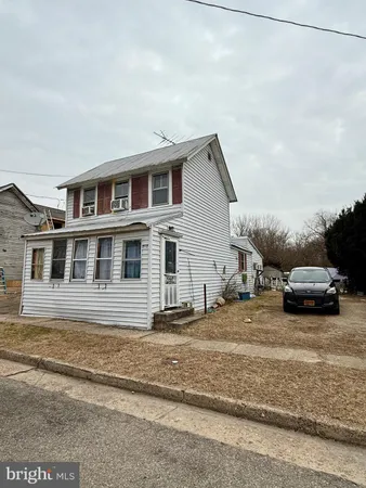 a view of a house with a patio