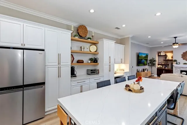 a view of a storage & utility room with racks on the wall
