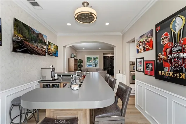 a spacious bathroom with a double vanity sink a mirror and shower
