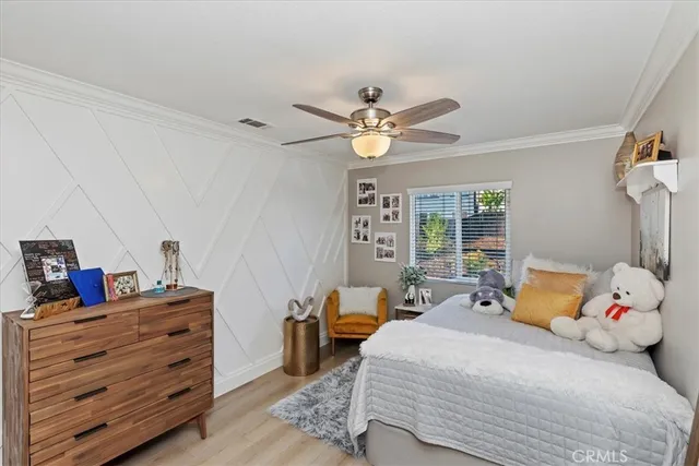 a view of a patio with dining table and chairs