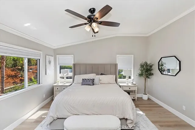 a view of a patio with dining table and chairs with potted plants
