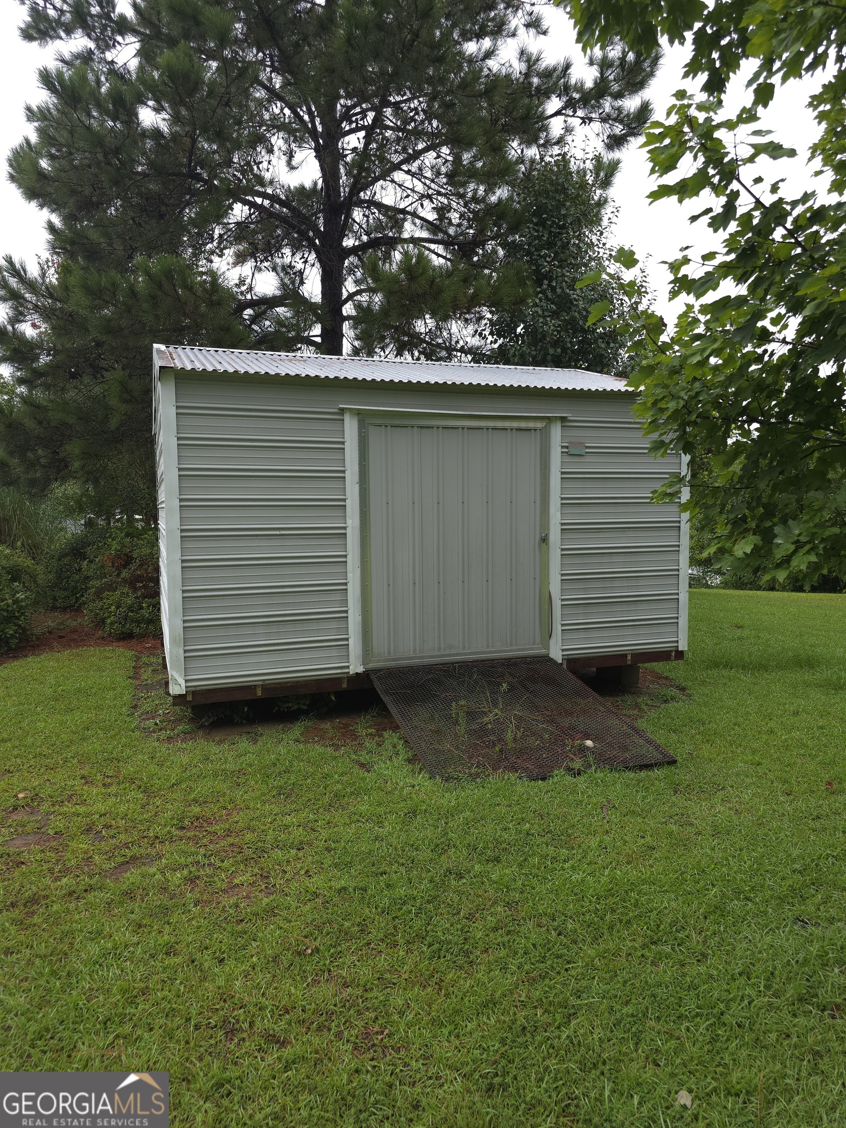 103 Windy Hill Court Dublin, GA 31021 - Photo 8 of 13 a view of a backyard