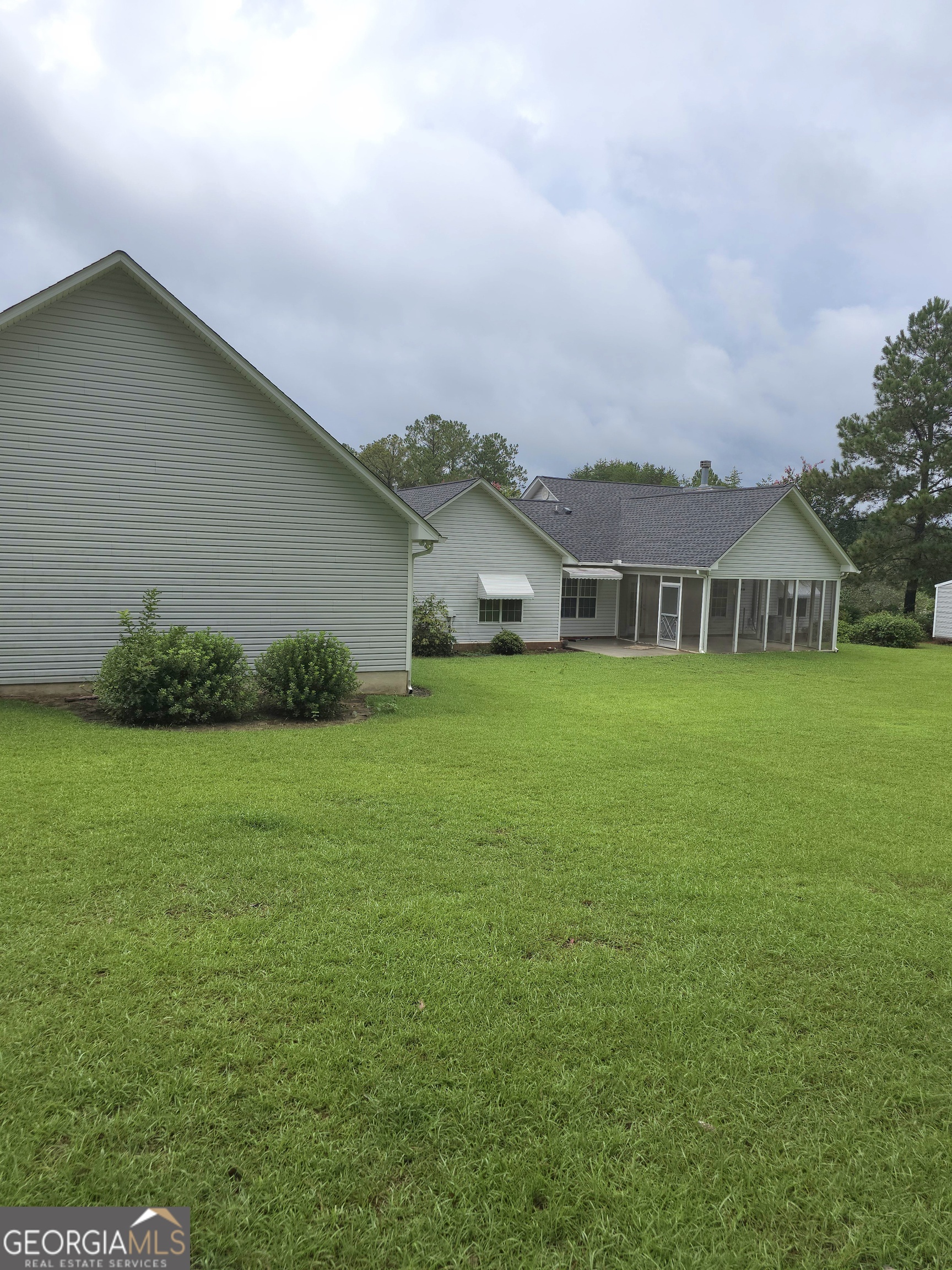 103 Windy Hill Court Dublin, GA 31021 - Photo 9 of 13 a view of house with garden