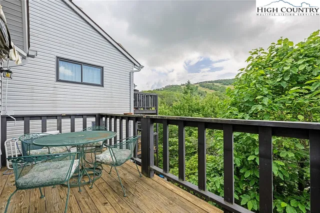 a view of a two chairs in the deck