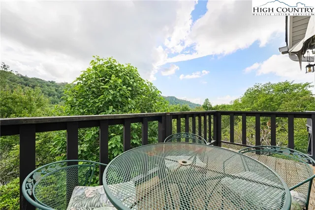 a view of a house with a yard and plants