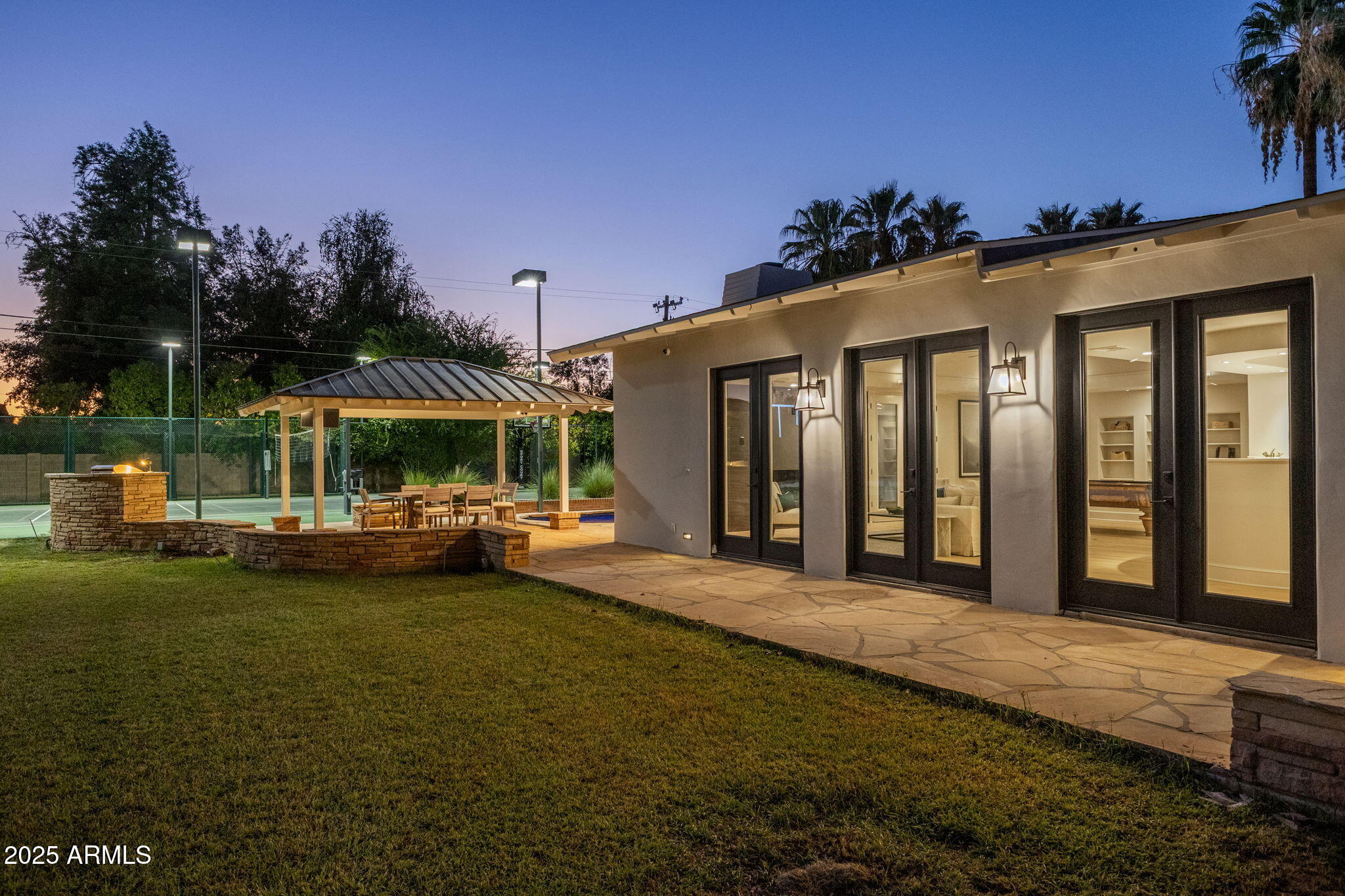 7030 North Wilder Road Phoenix, AZ 85021 - Photo 25 of 70 a view of a house with garden and porch