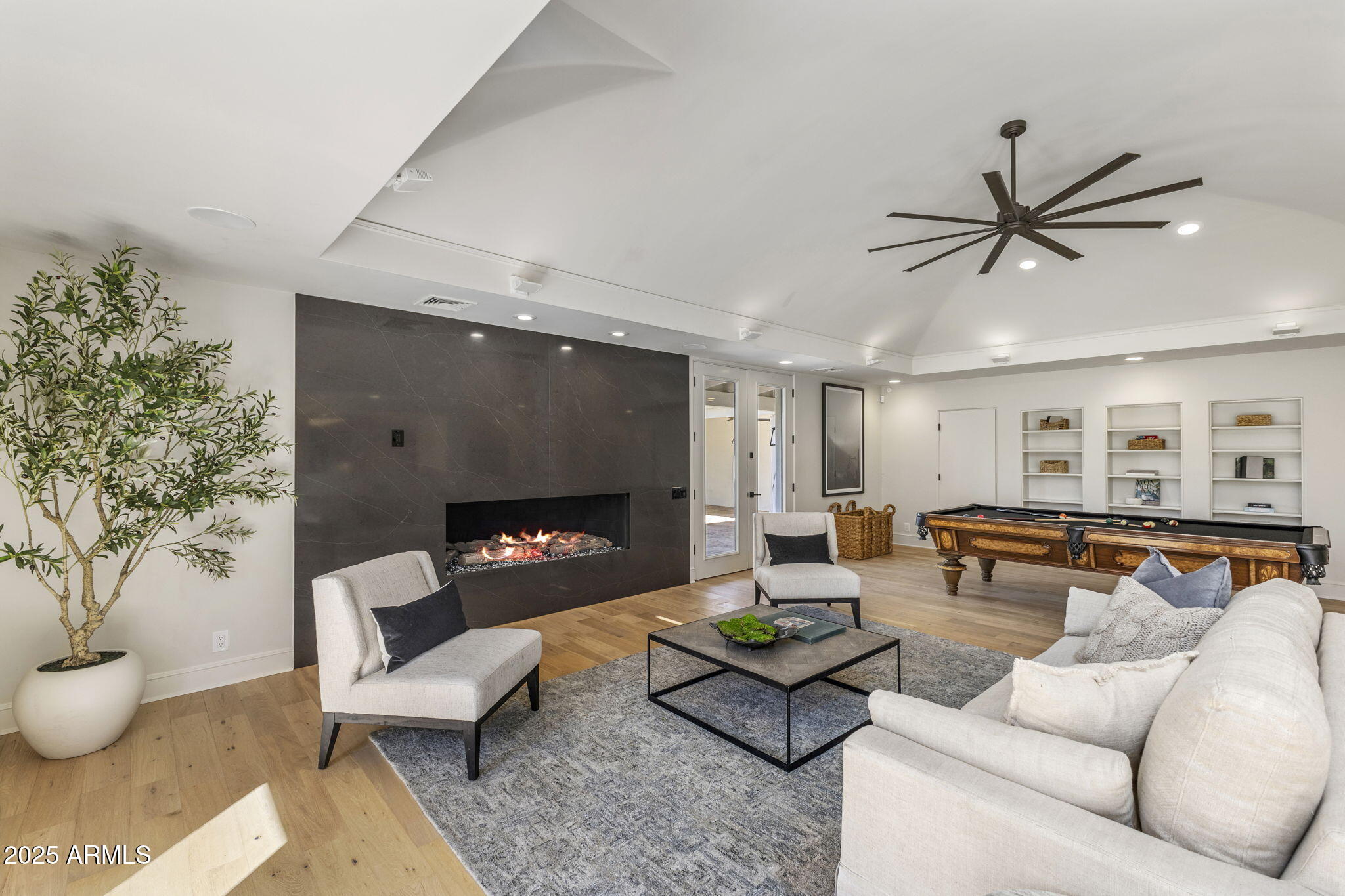 7030 North Wilder Road Phoenix, AZ 85021 - Photo 27 of 70 a living room with furniture and a fireplace