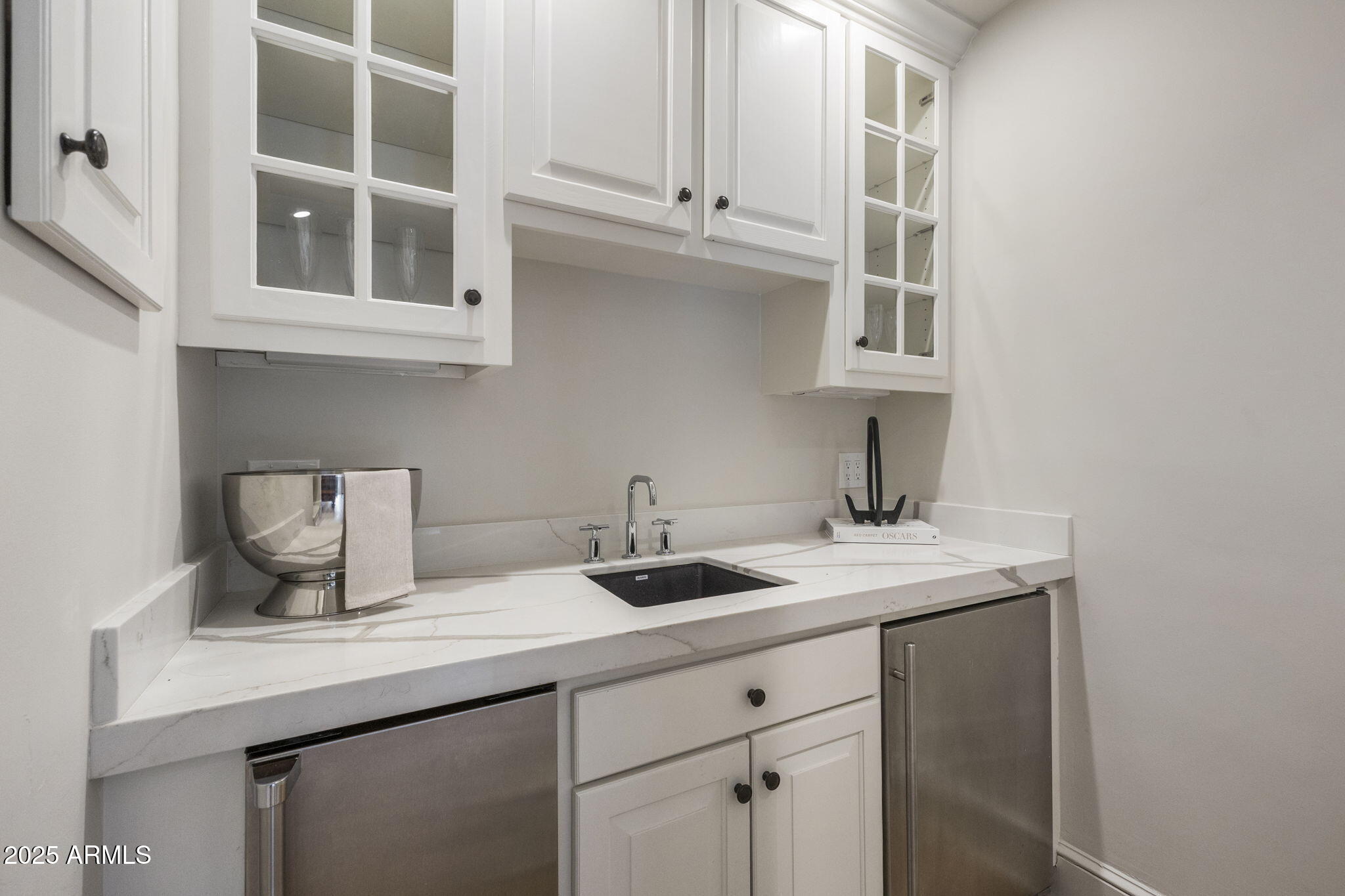 7030 North Wilder Road Phoenix, AZ 85021 - Photo 31 of 70 a kitchen with a sink and cabinets
