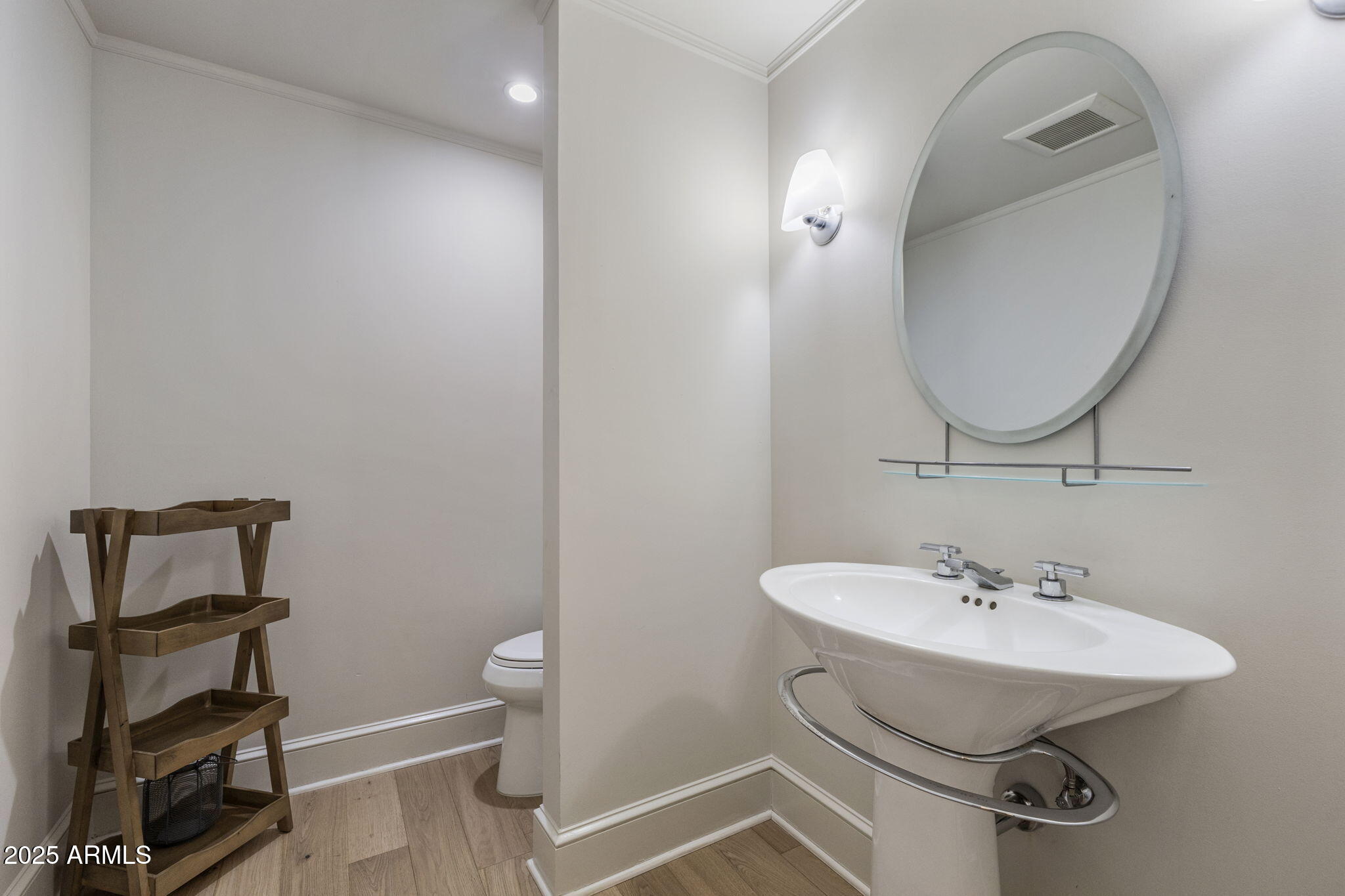 7030 North Wilder Road Phoenix, AZ 85021 - Photo 33 of 70 a bathroom with a sink toilet and a mirror
