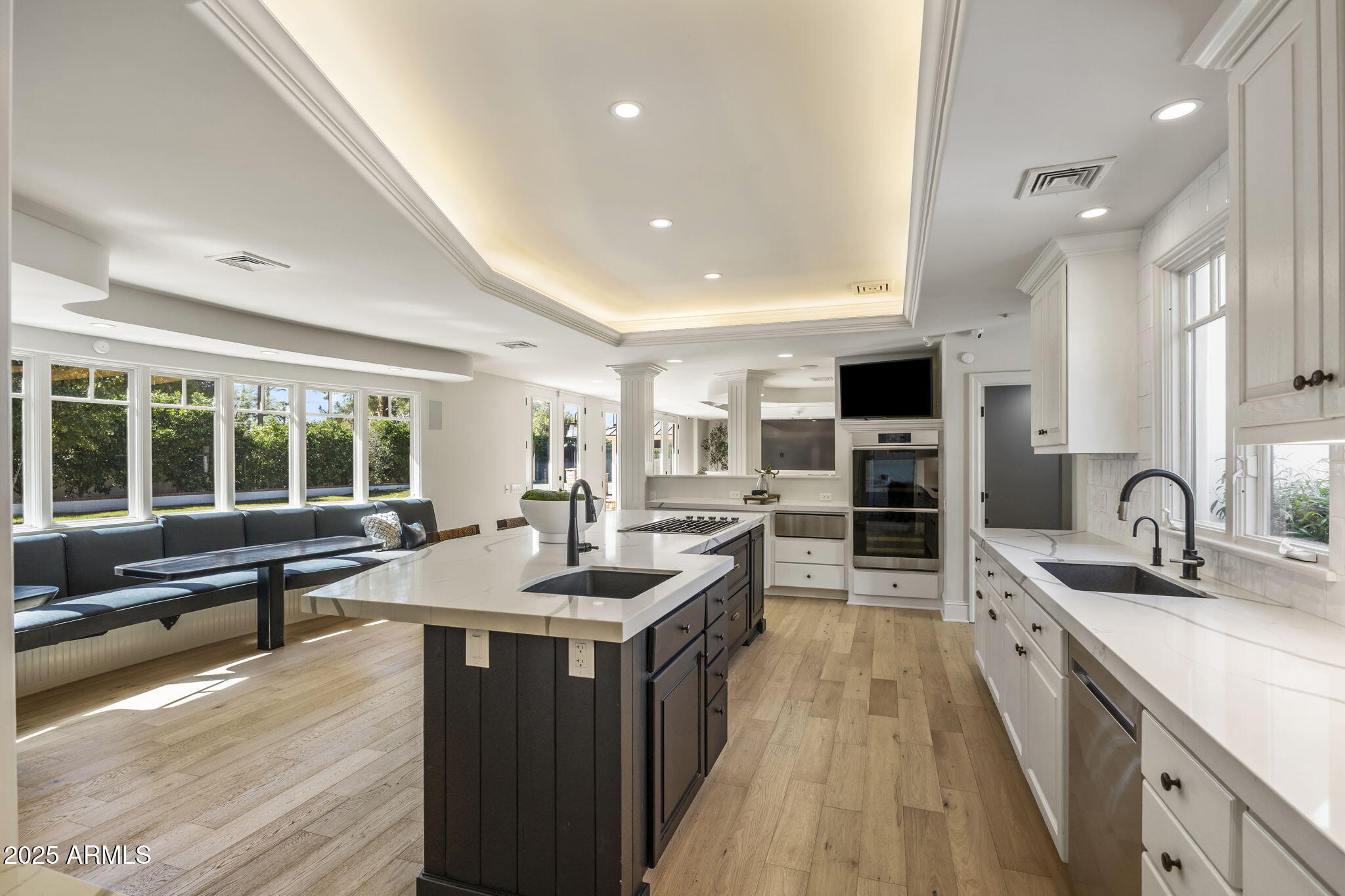 7030 North Wilder Road Phoenix, AZ 85021 - Photo 37 of 70 a kitchen with sink stove and cabinets