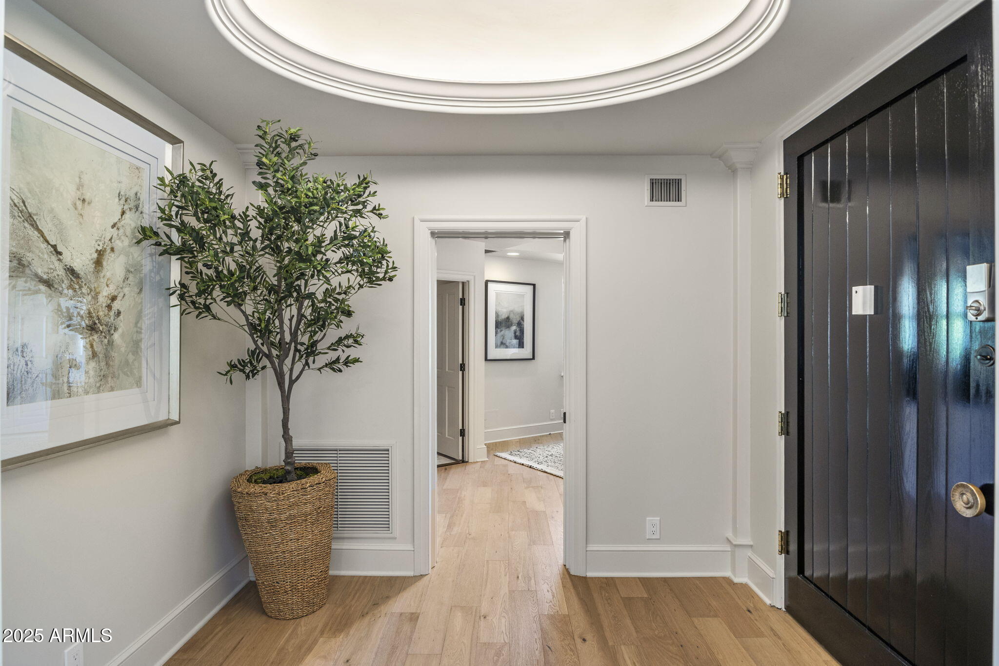 7030 North Wilder Road Phoenix, AZ 85021 - Photo 47 of 70 a view of entryway with wooden floor