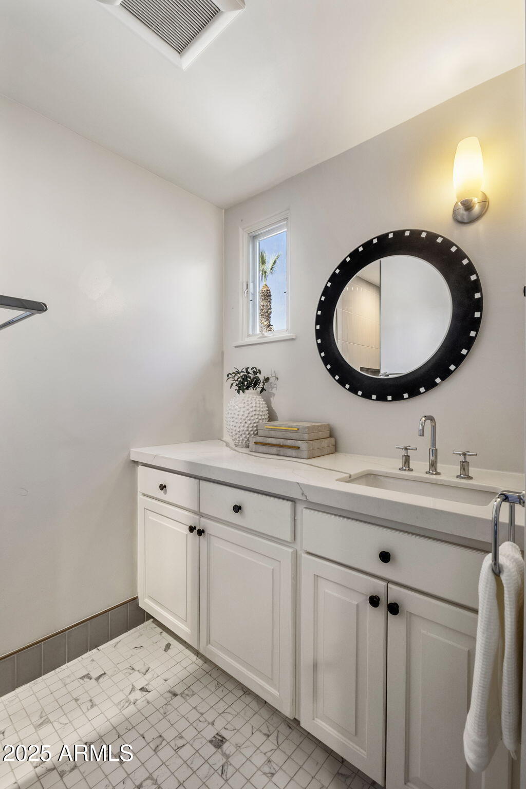 7030 North Wilder Road Phoenix, AZ 85021 - Photo 49 of 70 a bathroom with a double vanity sink and a mirror