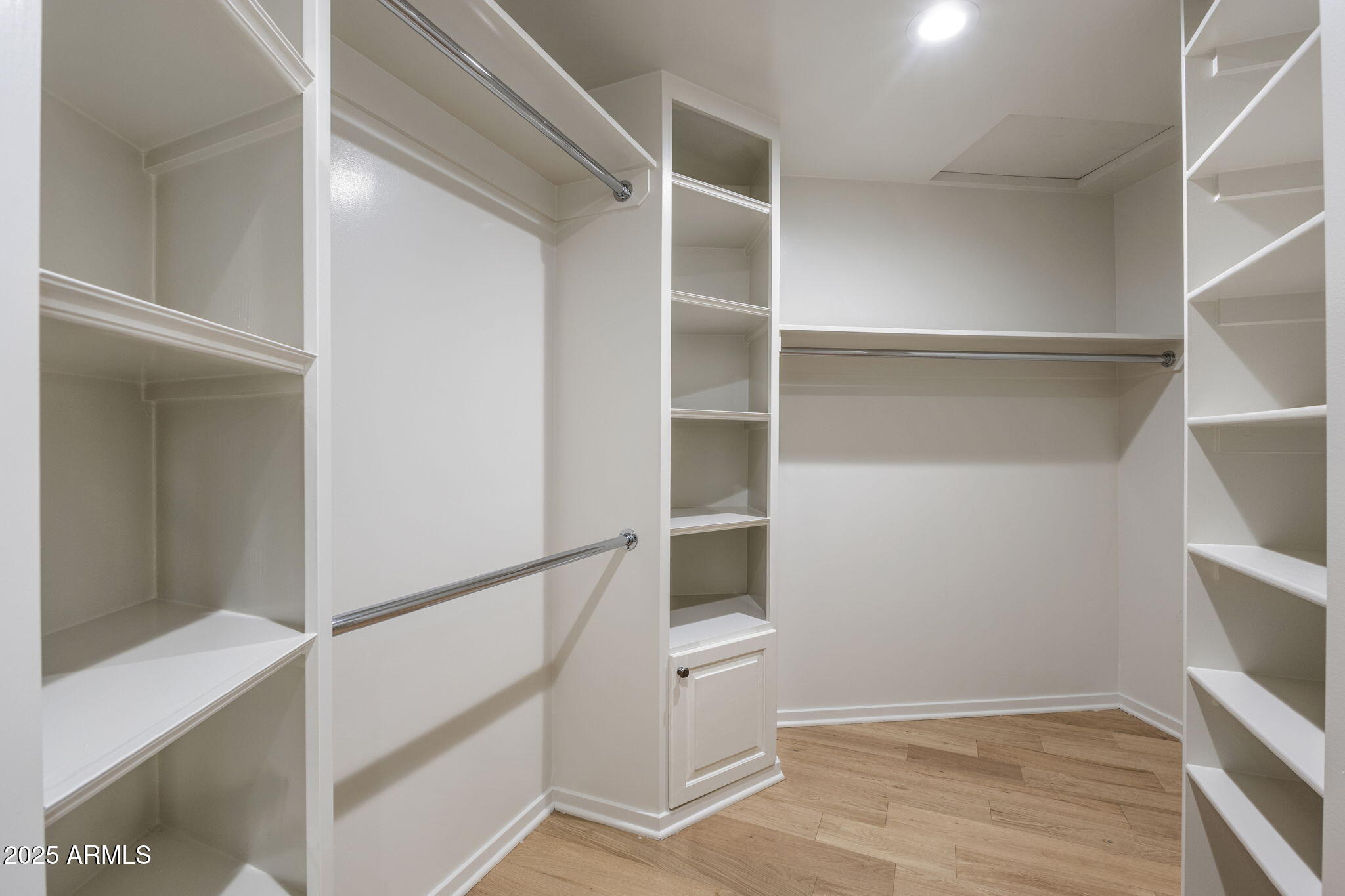 7030 North Wilder Road Phoenix, AZ 85021 - Photo 50 of 70 a view of an empty walk in closet