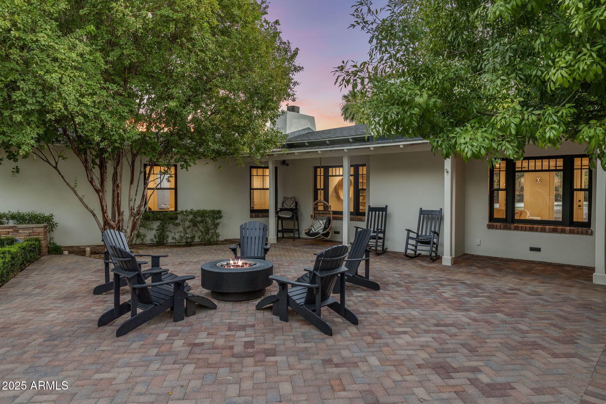 7030 North Wilder Road Phoenix, AZ 85021 - Photo 5 of 70 a view of a house with backyard sitting area and garden