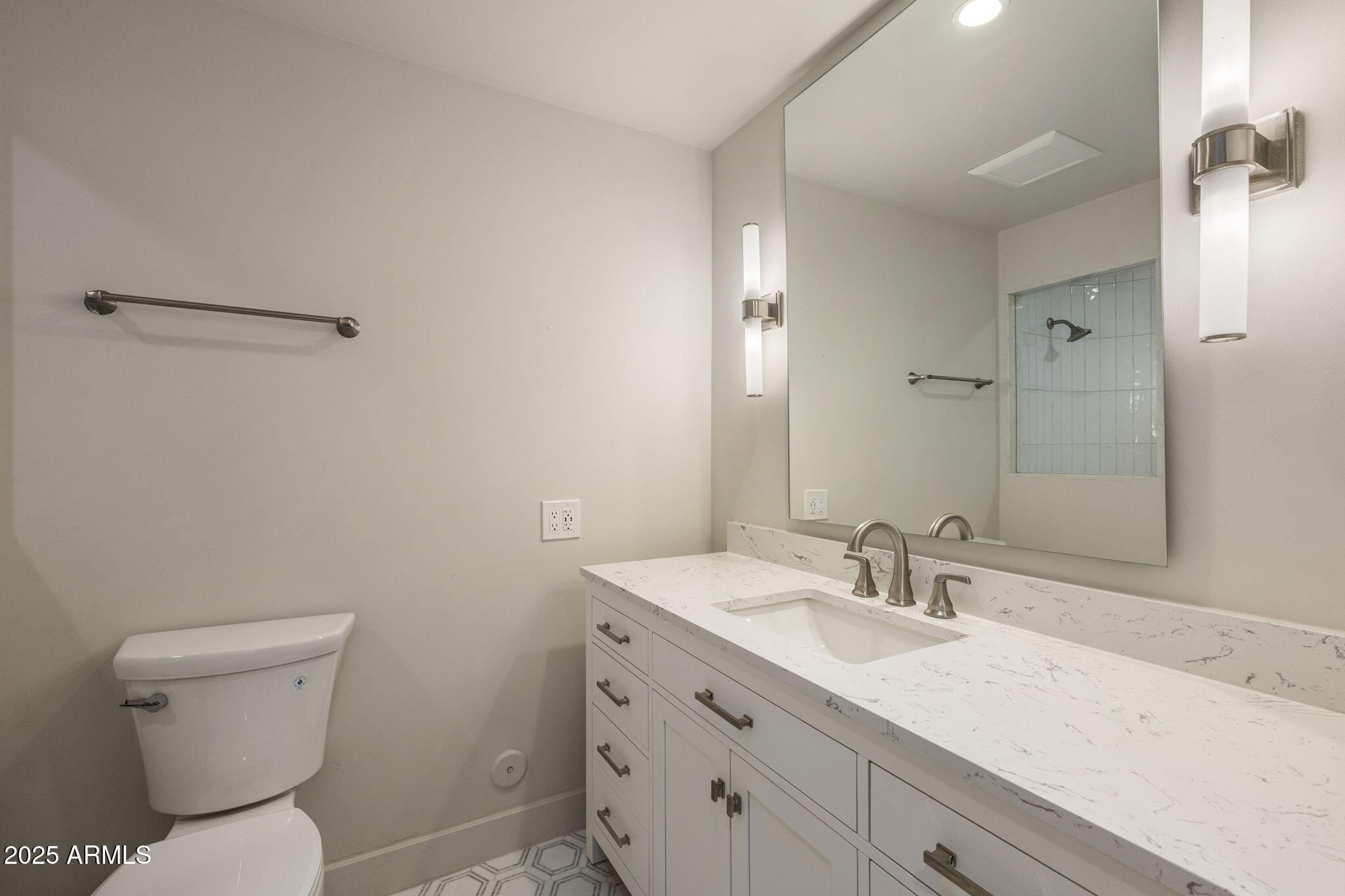 7030 North Wilder Road Phoenix, AZ 85021 - Photo 61 of 70 a bathroom with a sink toilet vanity and shower