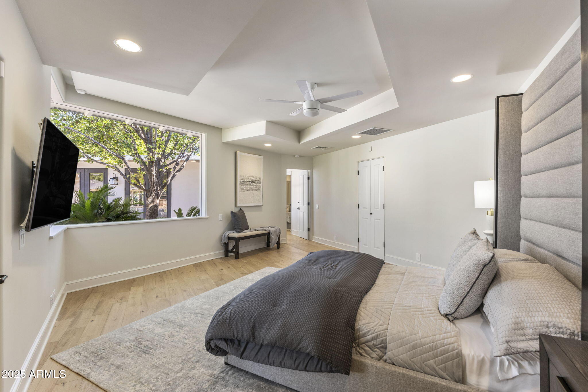 7030 North Wilder Road Phoenix, AZ 85021 - Photo 65 of 70 a bedroom with a bed and large window