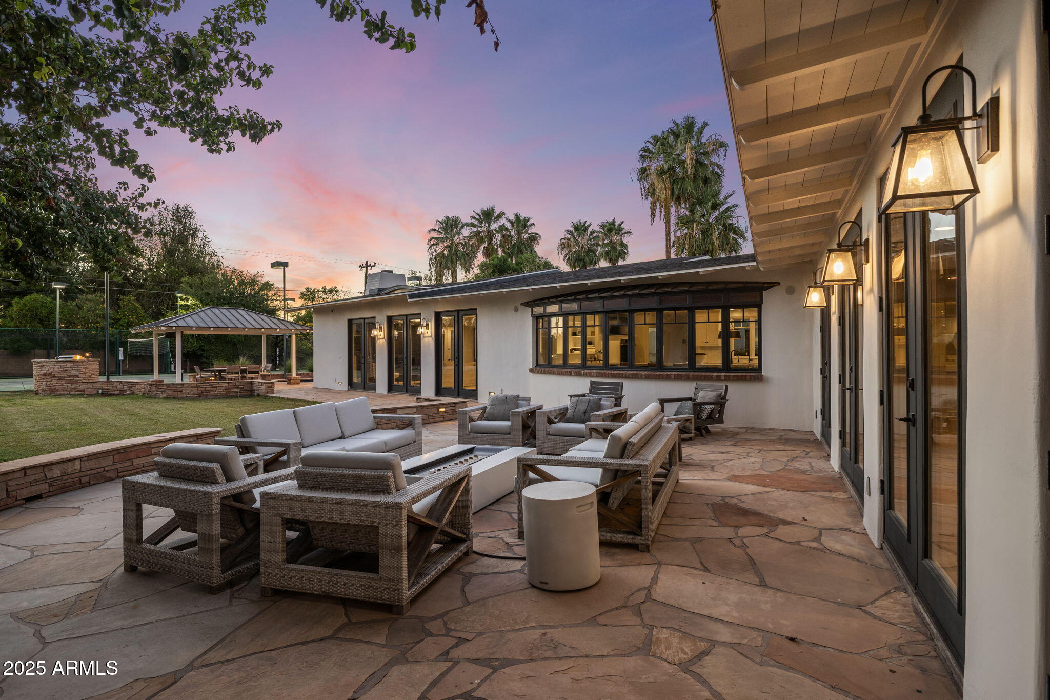 7030 North Wilder Road Phoenix, AZ 85021 - Photo 8 of 70 a front view of a house with outdoor seating