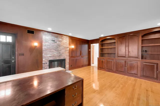 a view of kitchen with cabinets and stainless steel appliances