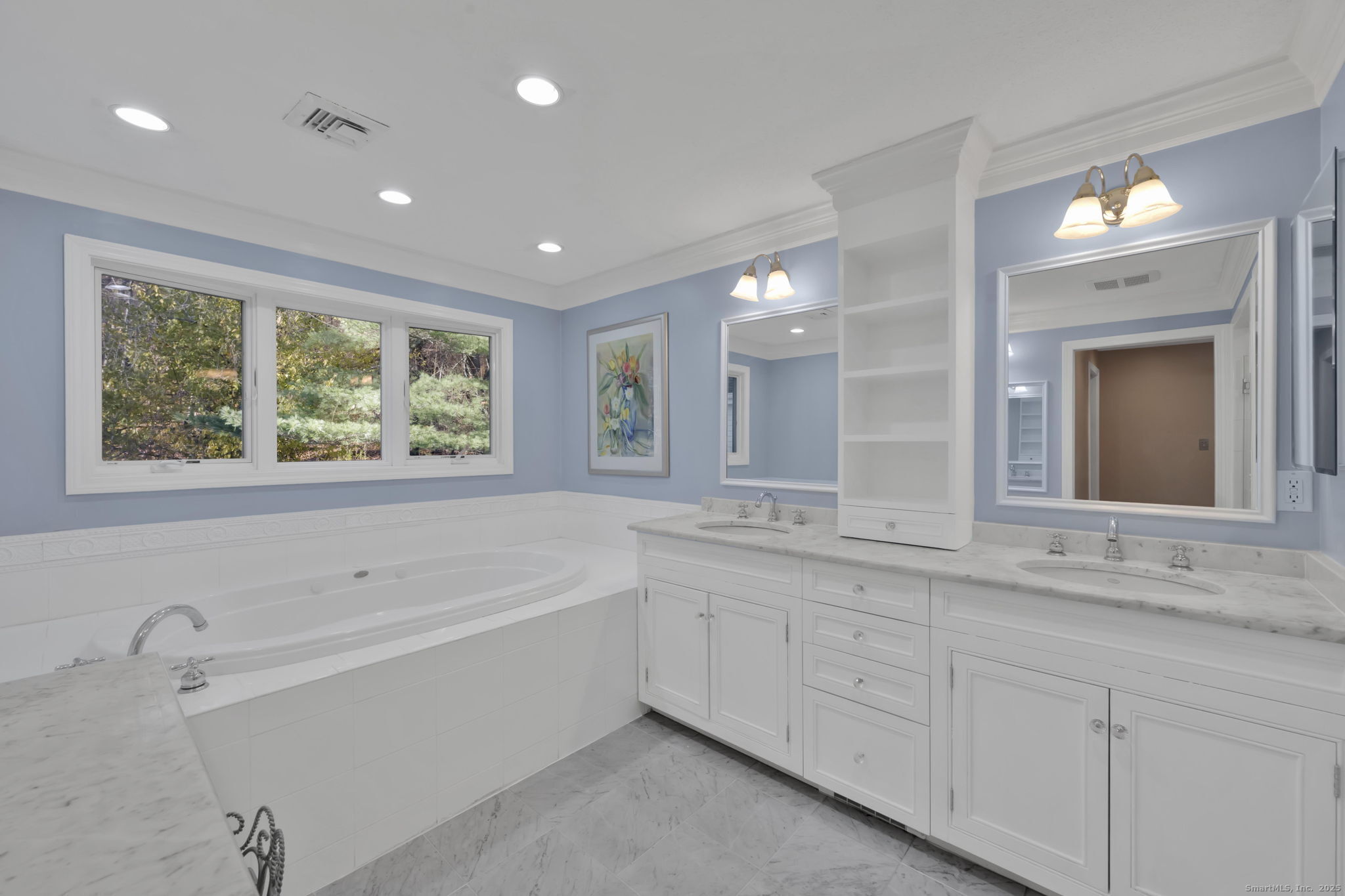 75 Arlen Way West Hartford, CT 06117 - Photo 24 of 39 a spacious bathroom with a tub double sink window and mirror