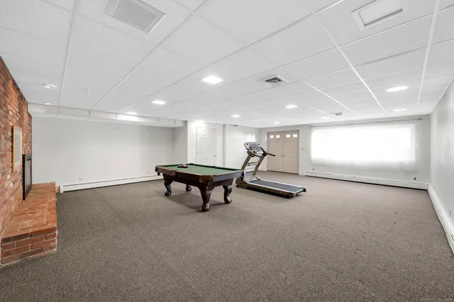 a room with furniture and a chandelier