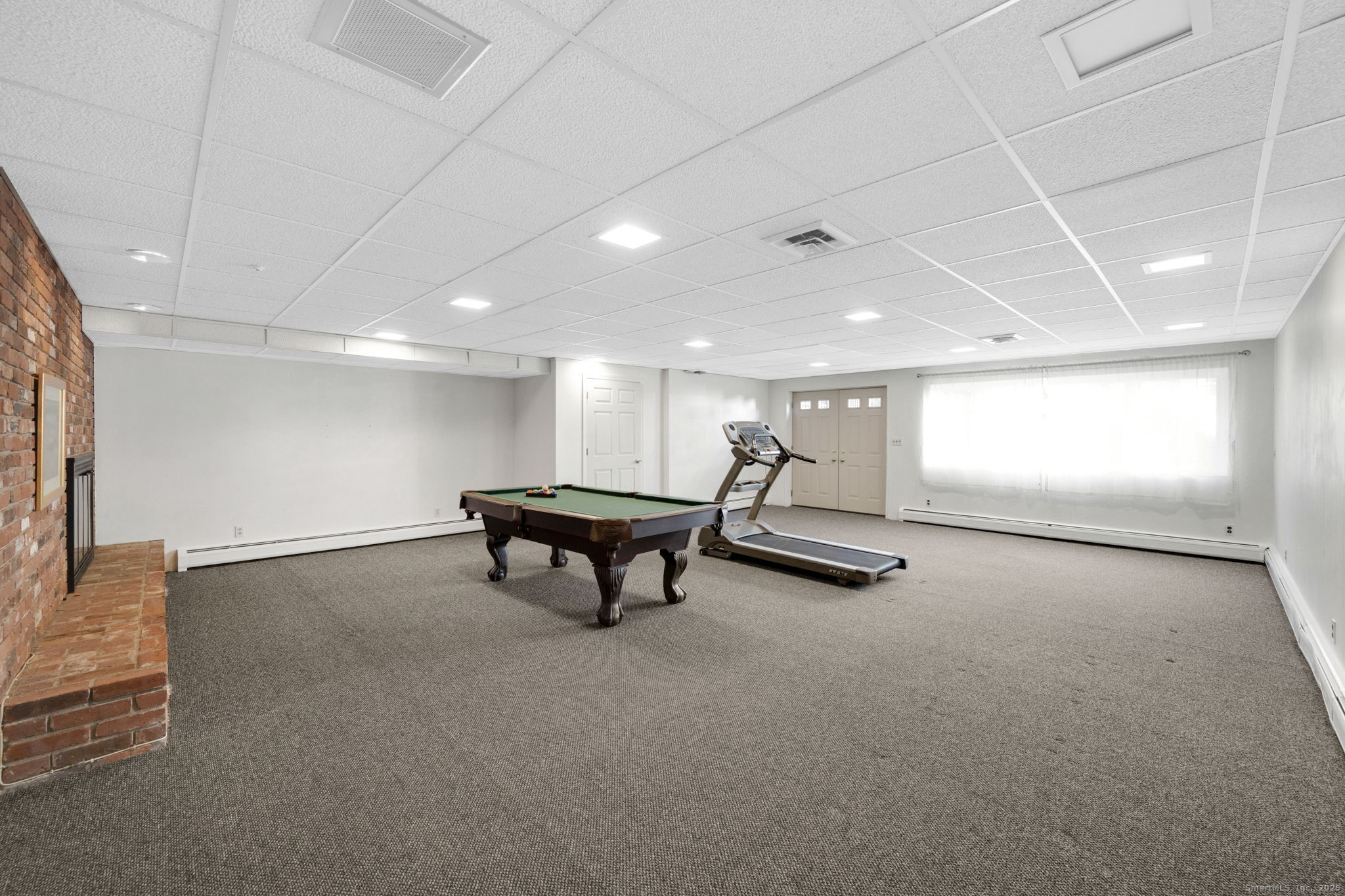 75 Arlen Way West Hartford, CT 06117 - Photo 32 of 39 a view of a room with gym equipment