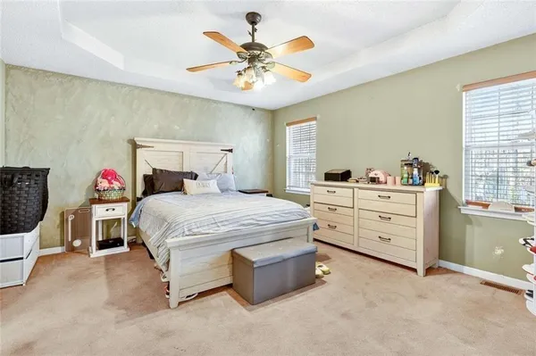 a living room with a flat screen tv