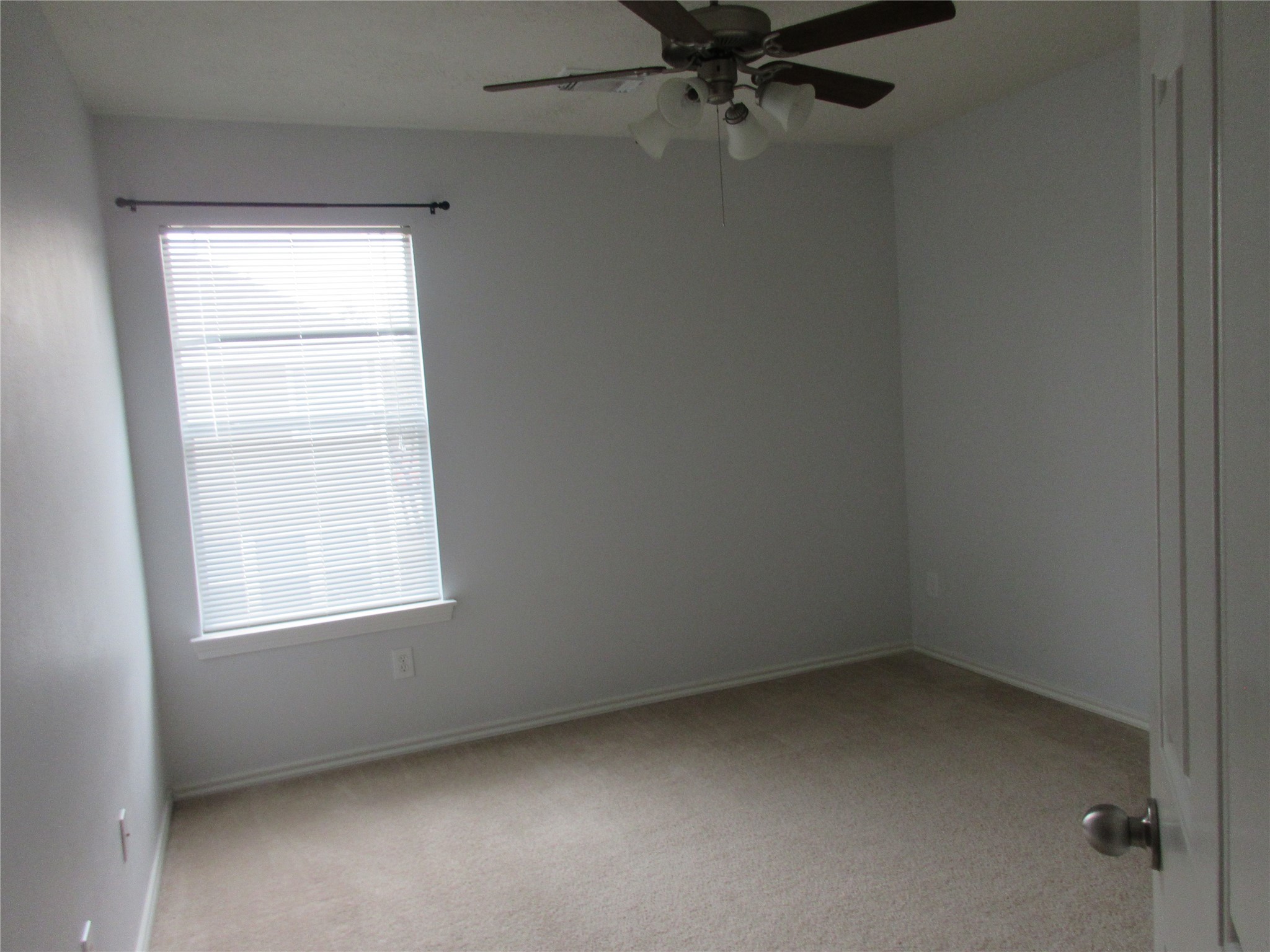 17522 Bering Bridge Lane Humble, TX 77346 - Photo 11 of 16 an empty room with a window