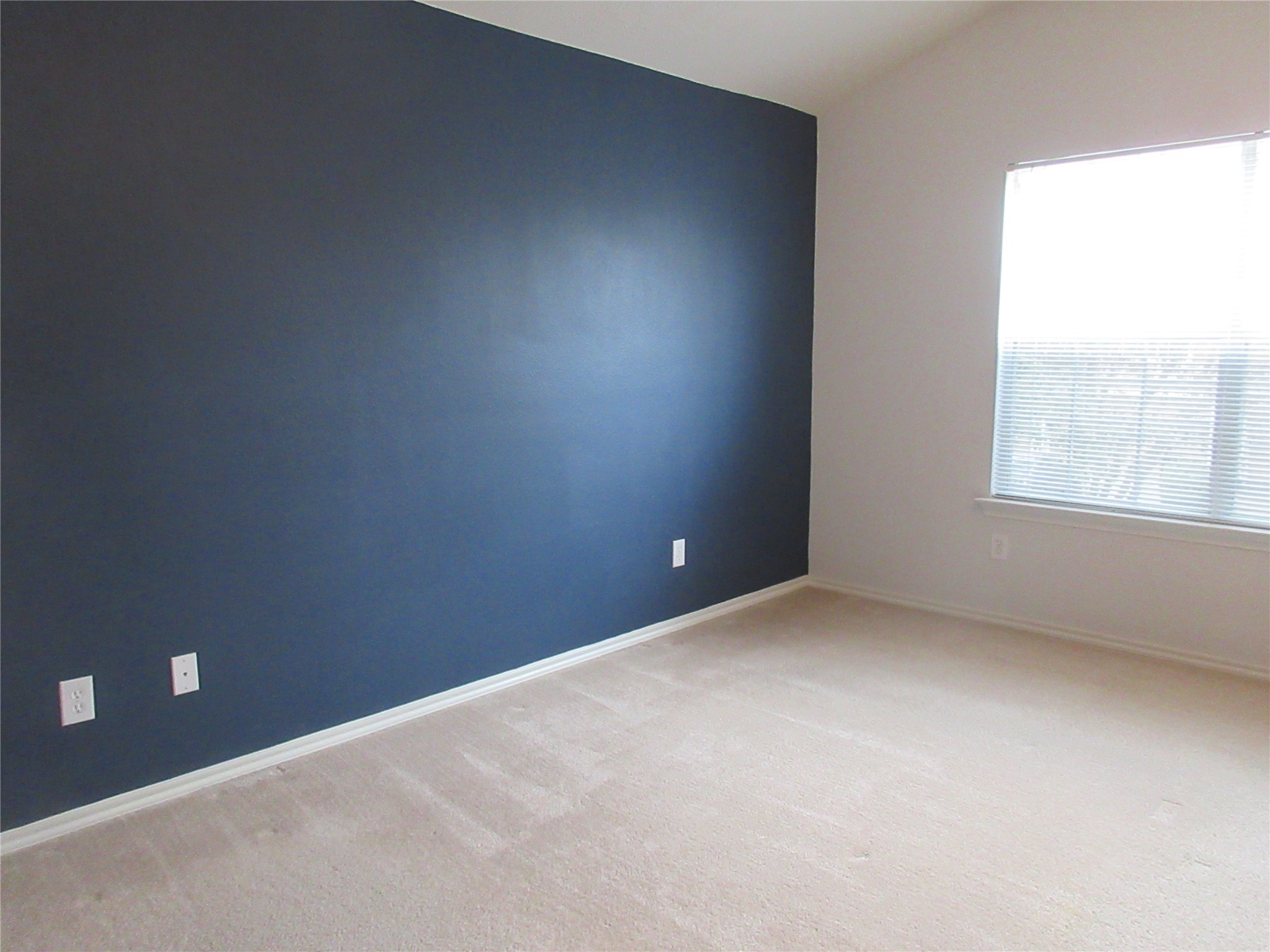 17522 Bering Bridge Lane Humble, TX 77346 - Photo 12 of 16 an empty room with a window