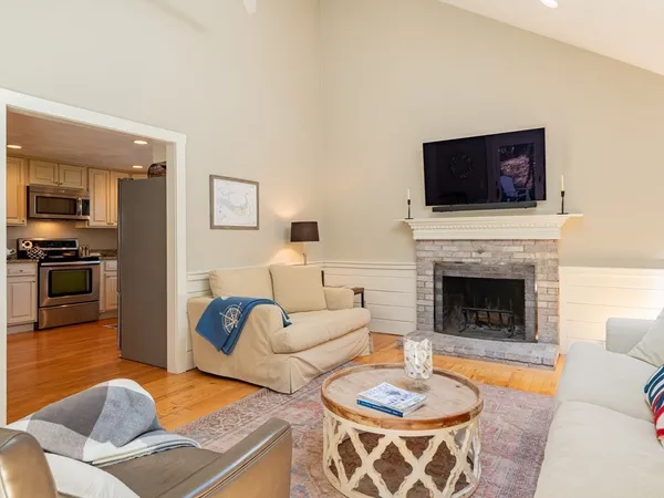 a bathroom with a toilet a sink and a mirror