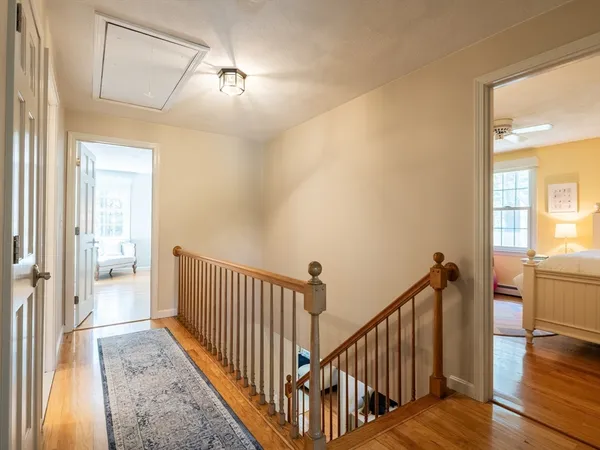 a spacious bedroom with a bed and a couch