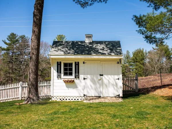 a view of outdoor space with trees all around