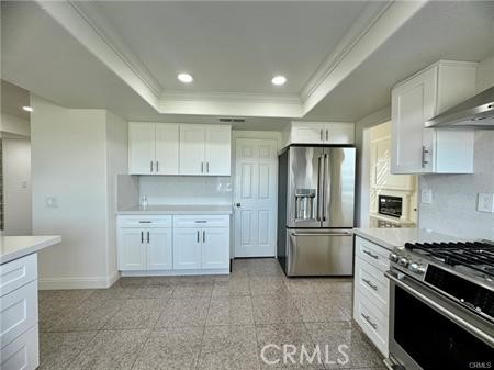 2410 Pointer Drive Walnut, CA 91789 - Photo 11 of 35 a kitchen with stainless steel appliances granite countertop a refrigerator and a stove top oven