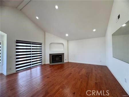 2410 Pointer Drive Walnut, CA 91789 - Photo 17 of 35 a view of empty room with wooden floor and fireplace