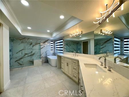 2410 Pointer Drive Walnut, CA 91789 - Photo 21 of 35 a bathroom with a tub sink and mirror