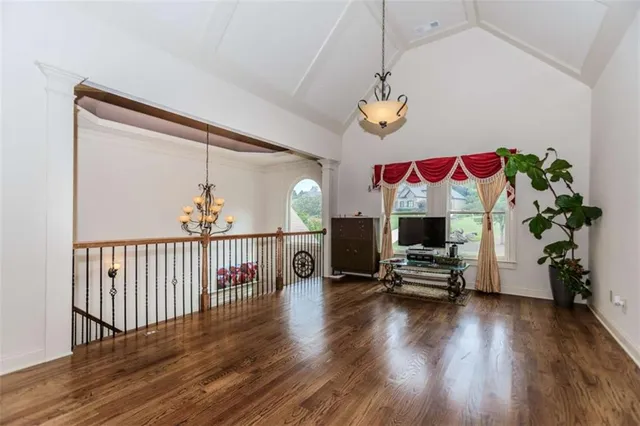 a view of a livingroom with wooden floor